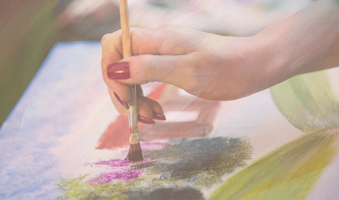 Mindfulness art making, a women with a paint brush